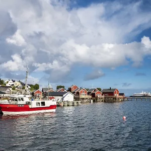 Rorbuer cabins and fishing boat in Reine Rorbuer cabins and fishing boat in Reine