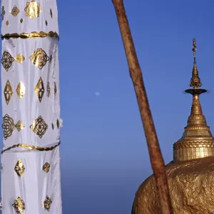 Round banner in front of the Golden Rock, Burma
