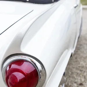 Round tail light of a German sports car from the sixties