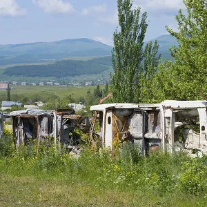 Row of Rusty Cars in Armenian Meadow Print