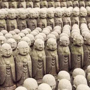 Rows of similar Japanese Jiizo sculptures Rows of similar Japanese Jiizo sculptures