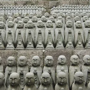 Rows of similar japanese jizo sculptures in Hase-Dera temple