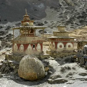 Two rustic choerten with strange red decoration Phu Nar-Phu Annapurna Region Nepal