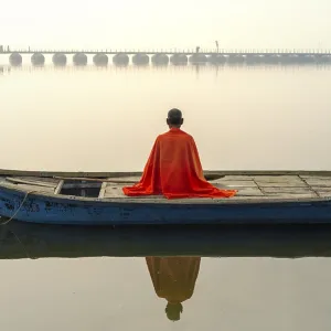 Sadhu on a Boat at Sunrise, Allahabad Kumbh Mela Print Sadhu on a Boat at Sunrise, Allahabad Kumbh Mela Print