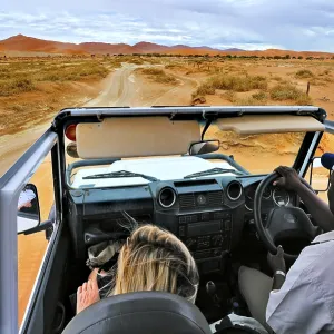In Safari car on the dunes of the Sossusvlei In Safari car on the dunes of the Sossusvlei