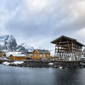 Sakrisoy, yellow houses and fish rack Sakrisoy, yellow houses and fish rack