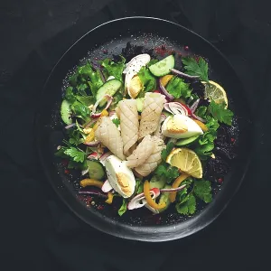Salad of squid and vegetables, with egg