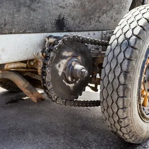 SAMARA, RUSSIA - JUNE 16, 2014: Chain drive the rear wheels of a retro car American La France Tourer 1917 year SAMARA, RUSSIA - JUNE 16, 2014: Chain drive the rear wheels of a retro car American La France Tourer 1917 year