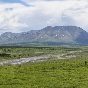 Savage River, tundra and mountainous landscape Savage River, tundra and mountainous landscape