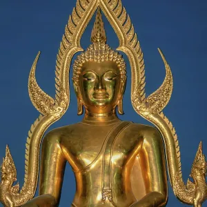 Scanned slide of a historical colour photograph of a gilded Buddha in a pagoda in Vietnam Scanned slide of a historical colour photograph of a gilded Buddha in a pagoda in Vietnam