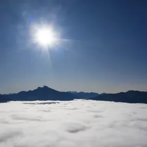 Schafberg and Dragon Wall rising out of the sea of fog