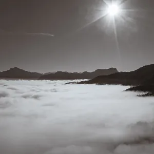 Sepia colours, Schafberg and Drachenwand rise out of the sea of fog