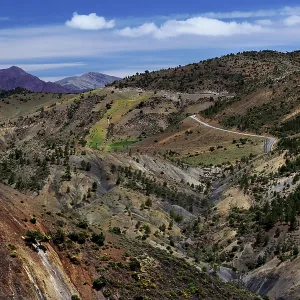 Serpentine road through the mountainous landscape of the High Atlas Mountains
