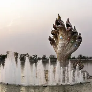 Seven-headed Naga serpent and fountain in front of the Elephant Temple Thep Wittayakhom Vihara