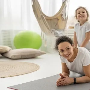 Full shot woman kid mat Full shot woman kid mat
