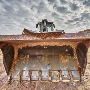 Shovel excavator in kaolin pit Shovel excavator in kaolin pit