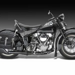 Sideways shot of a vintage motorbike in gradient back