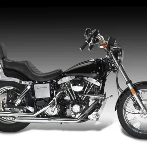 Sideways shot of a vintage motorbike in gradient back