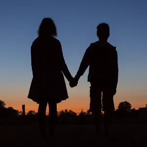 Silhouette in front of evening sky