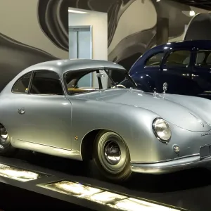 Silver Porsche classic car from 1952 in the museum