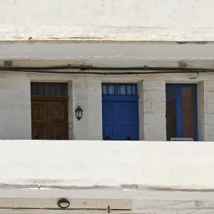 Simple building with windows, doors and balconies in the style of constructivism on Malta Simple building with windows, doors and balconies in the style of constructivism on Malta