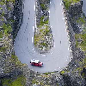 Single car, hairpin bend at the mountain road Trollstigen Single car, hairpin bend at the mountain road Trollstigen