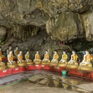 Sitting Buddha statues in the Bayin Nyi Cave Temple Sitting Buddha statues in the Bayin Nyi Cave Temple