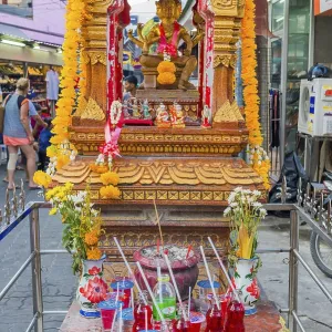 Small Buddhist temple with offering Small Buddhist temple with offering