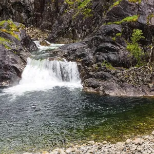 Small waterfall in a stream. Road to Roldal