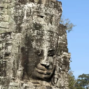 Smile of Angkor, huge face carved in stone on a tower