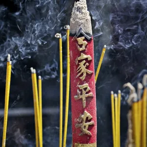 Smoking incense in the temple Chua Thien Hau Pagoda