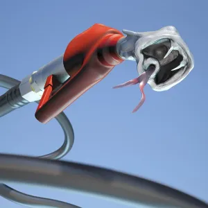 Snappish petrol nozzle with the mouth of a snake Snappish petrol nozzle with the mouth of a snake