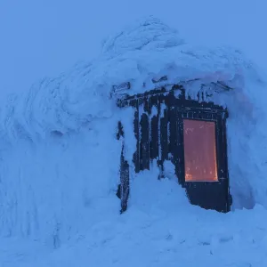 Snow-covered hut, Dundret Nature Reserve