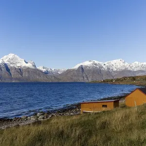 Snow-covered mountains at Lyngen Fjord, September 2024, Norway, Europe Snow-covered mountains at Lyngen Fjord, September 2024, Norway, Europe