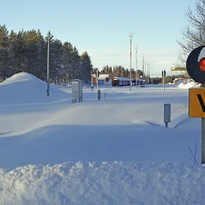 Snow-covered railway line and station
