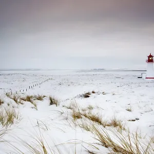 Snow on the island of Sylt at the Ellenbogen at the Lighthouse West Snow on the island of Sylt at the Ellenbogen at the Lighthouse West