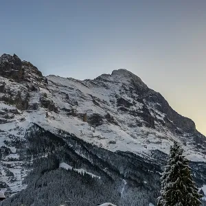 Snowcapped Mountain Peak Eiger at 3970 Meter High in Sunset in Winter in Grindelwald Snowcapped Mountain Peak Eiger at 3970 Meter High in Sunset in Winter in Grindelwald