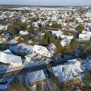 Snowy residential area with houses Snowy residential area with houses