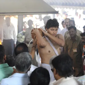 Son Akash at funeral of Anti Terrorism Squad Chief Hemant Karkare killed by terrorist attack in Bombay Mumbai