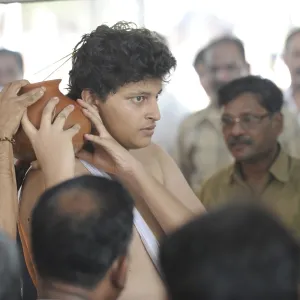 Son Akash at funeral of Anti Terrorism Squad Chief Hemant Karkare killed by terrorist attack in Bombay Mumbai