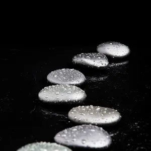 Spa Stones. shiny zen stones with water drops Spa Stones. shiny zen stones with water drops