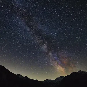 Sparkling Milky Way over a nocturnal mountain panorama