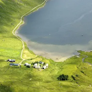 Spots of sun at mountains and lake Kartfjorden Vestvagoya Lofoten Norway Spots of sun at mountains and lake Kartfjorden Vestvagoya Lofoten Norway