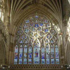 Stained glass of the west window inside Exeter cathedral church Stained glass of the west window inside Exeter cathedral church