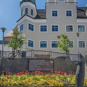 Staircase with spring flowers and artwork