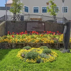 Staircase with spring flowers and artwork
