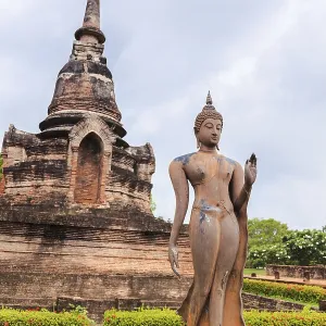 Standing buddha statue in sukhothai historical park