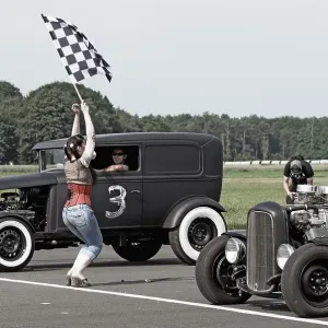 Starter girl starting a hot rod race