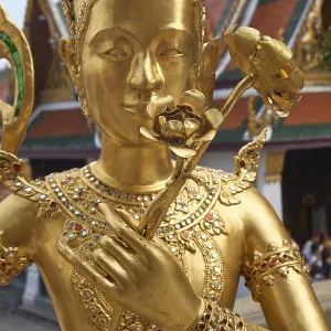 Statue of a kinnara in Wat Phra Kaew Statue of a kinnara in Wat Phra Kaew