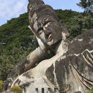 Statue of Reclining Buddha in the Park near Vientiane Statue of Reclining Buddha in the Park near Vientiane